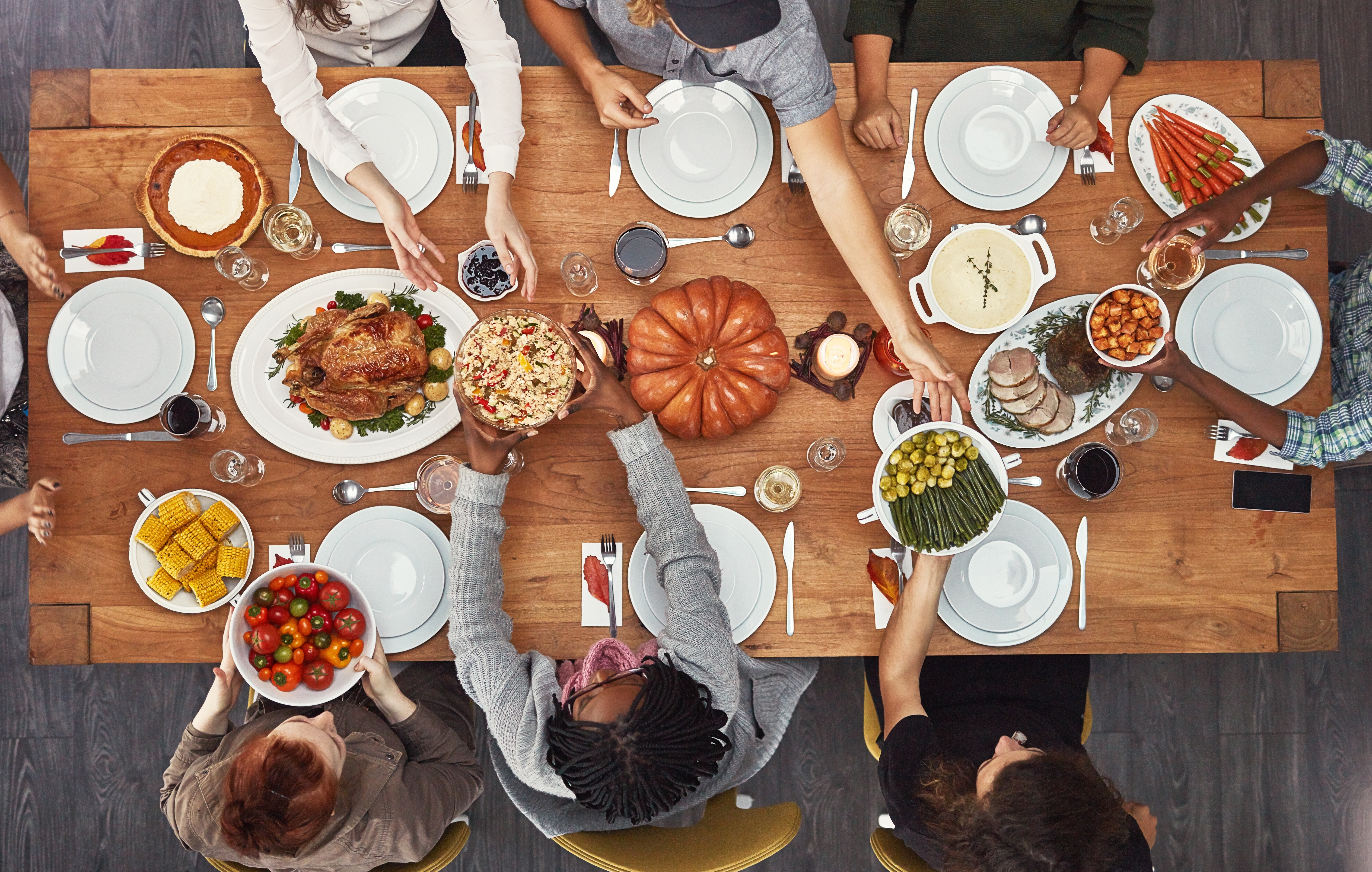 "Friendsgiving" describes a meal, usually potluck-style, shared with friends around the time of Thanksgiving. The custom may be centuries old, but the word only entered Merriam-Webster
